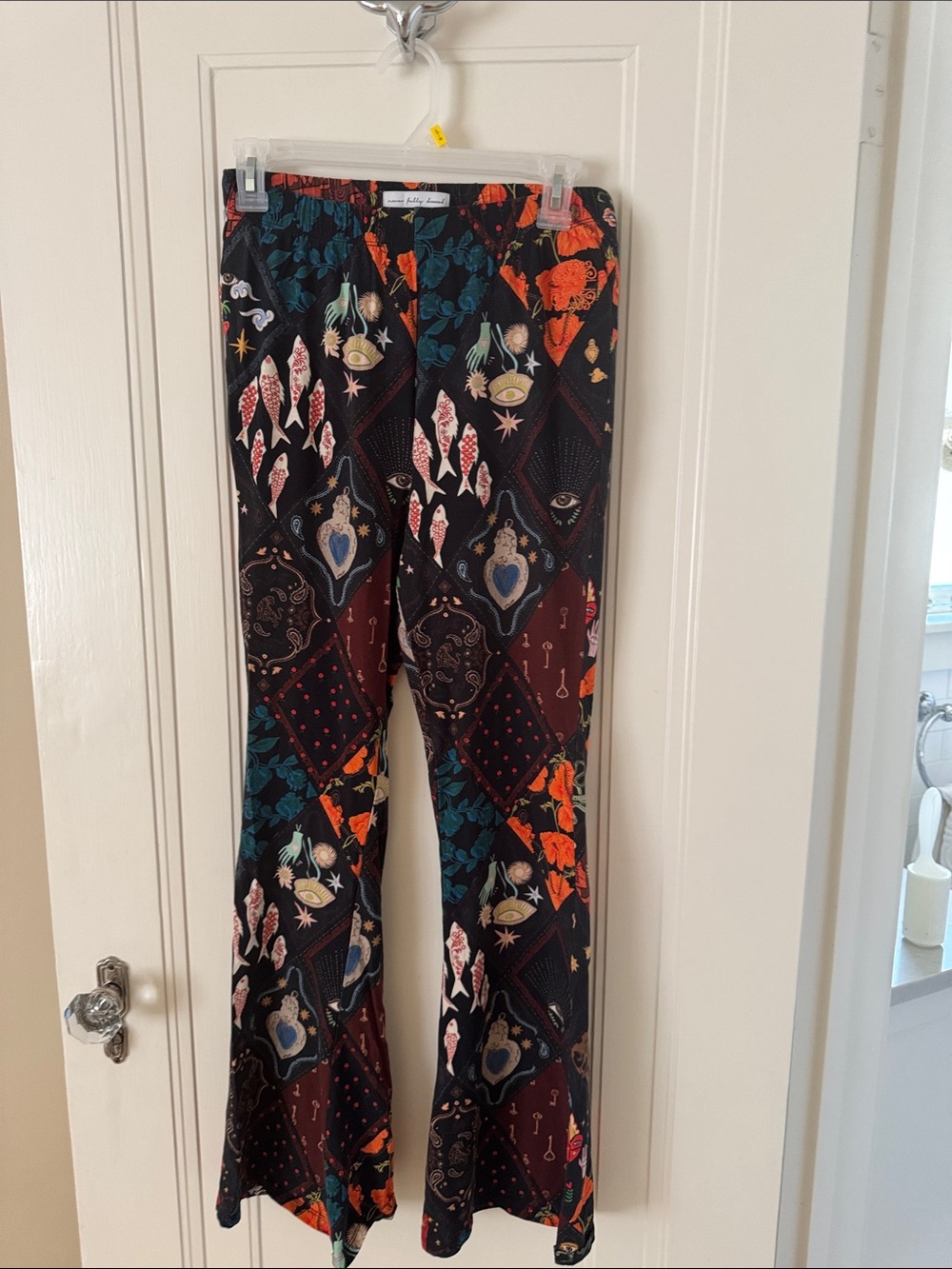 Never Fully Dressed Black Multicolor Patterned Flare Leggings - Picture 1 of 5